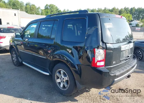 2009 Honda Pilot Touring z USA, uszkodzony, nr VIN 5FNYF48979B045771
